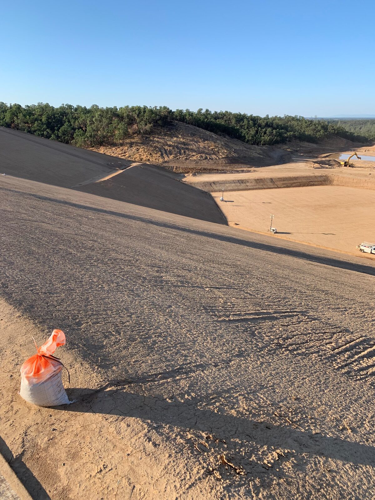 Concrete curb pour with Cementech mixer and loader